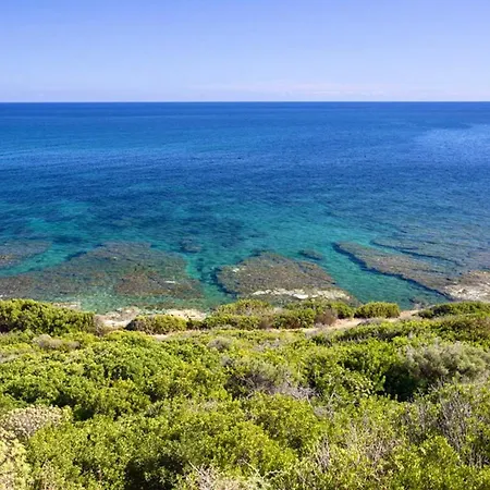 Ξενοδοχείο με διαμερίσματα Village In Porto Corallo Just 200 Meters From The Beach, With Private Outdoor Area